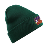 The Click & Collect Joint Team Beanie by College Football Ireland Store is a dark green knit beanie with embroidered K-State Wildcats and Iowa State Cyclones patches on the front cuff.