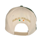 The Click & Collect Joint Team Cap from College Football Ireland Store features a beige design with DUBLIN IRELAND embroidered in gold, green, white, and orange stars on the back, plus an adjustable snap closure.